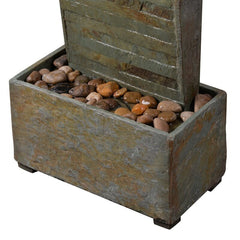 Natural Stone Floor Fountain with Light Rectangular Base Supports The water Wall, with River Stones Resting on The Bottom