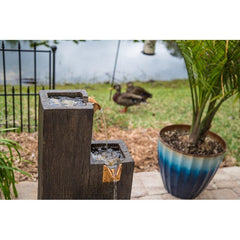 Resin Floor Fountain Perfect To Be Placed in a Garden Filled with Blue Fescue Grass 360-Degree View