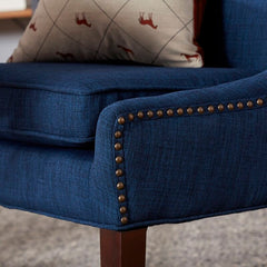 Wingback Chair Adds Stately Style To Any Living Room or Den Four Tapered Legs and Features Neutral-Hued Polyester