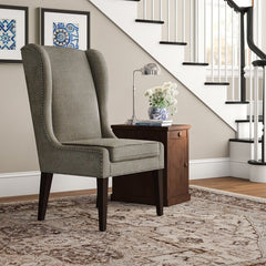 Gray Wingback Chair Adds Stately Style To Any Living Room Or Den. Its Solid and Wood Frame is Founded Atop Four Tapered Legs