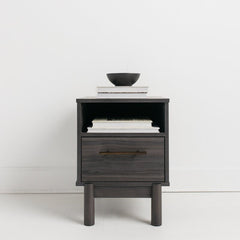 1 - Drawer Nightstand in Warm Gray Creates A Modern Sense of Harmony in your Room Goldtone Handles Add An Authentically Modern Touch